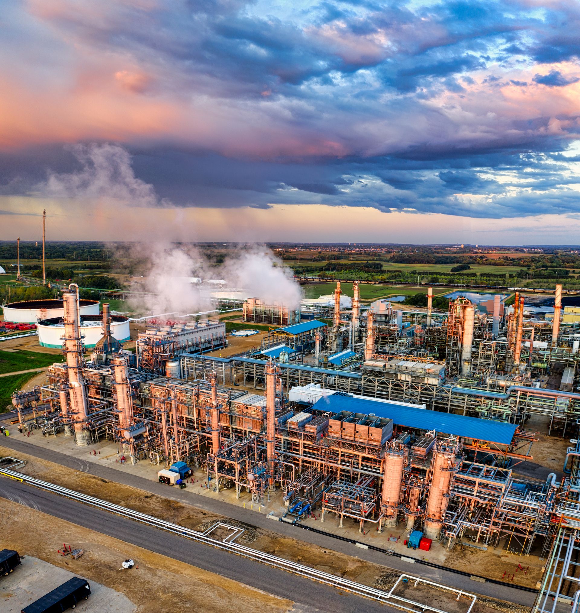 Aerial view of an oil refinery at sunset