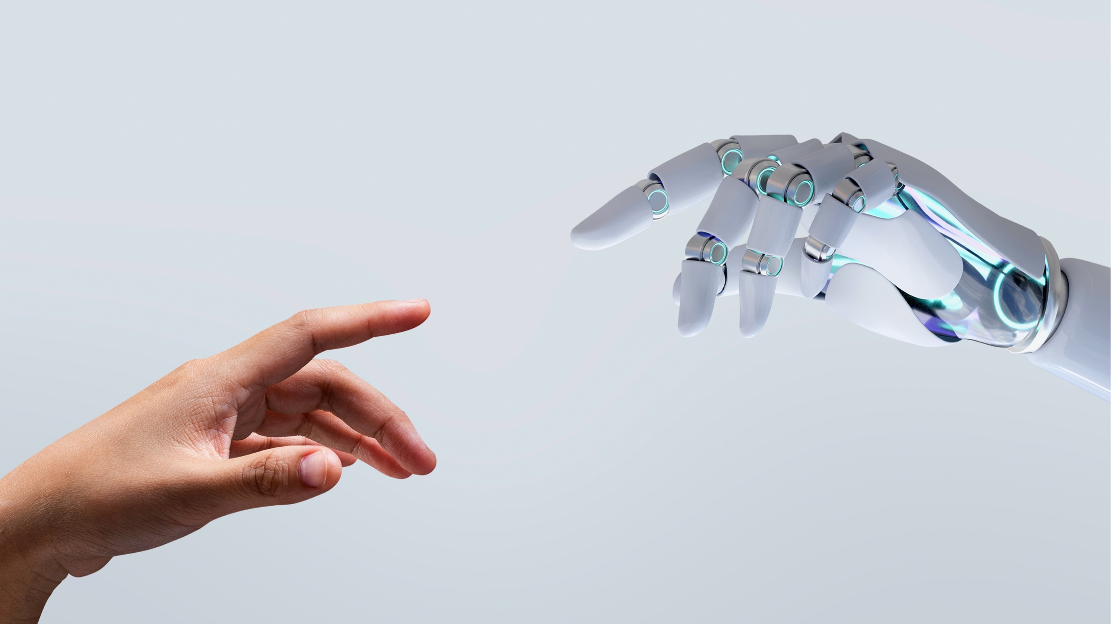 Human and Robot Hands Reaching Out