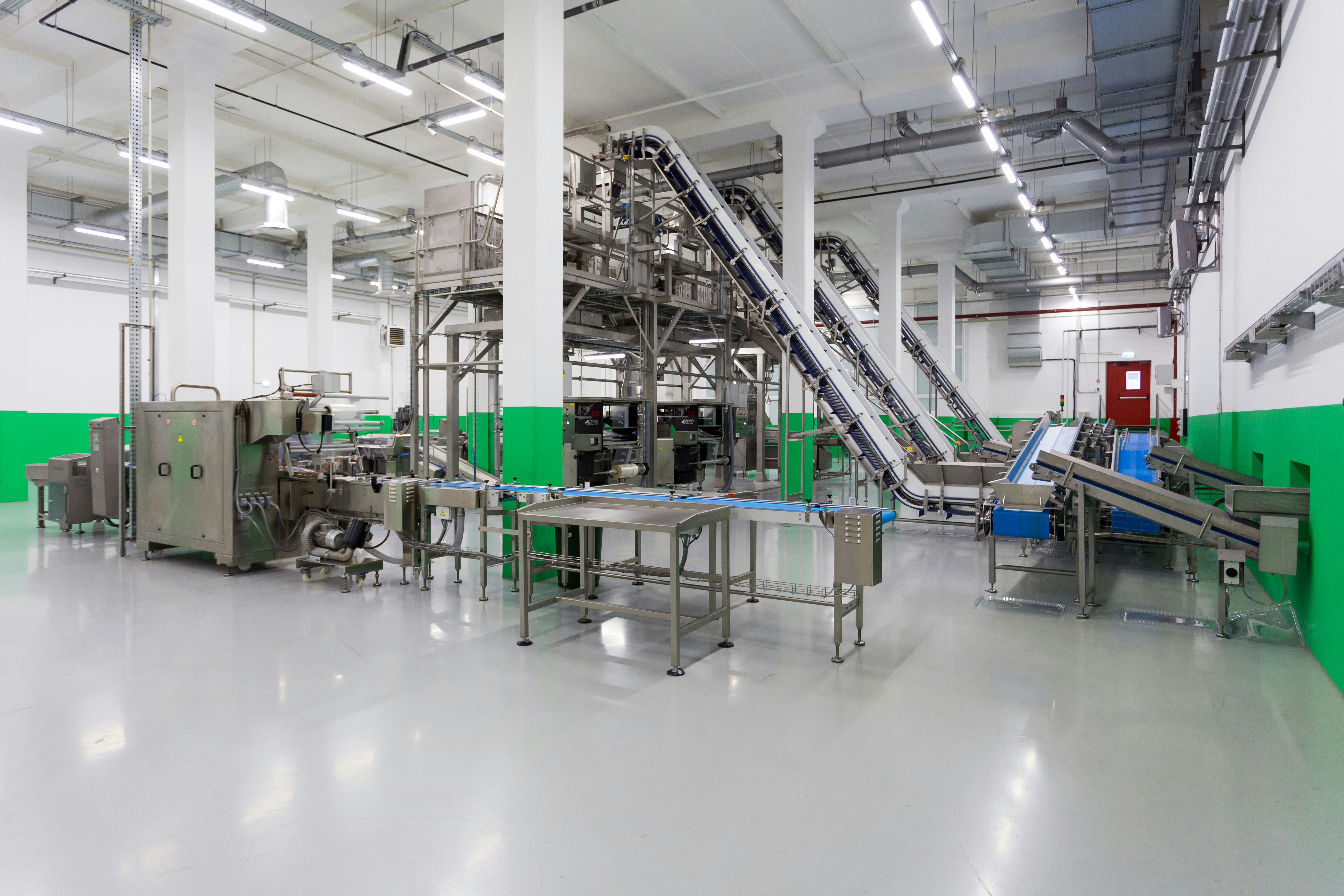 Modern, brightly lit food or pharmaceutical production facility.